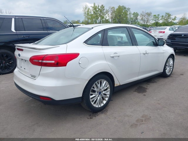 Продажа на аукционе авто 2016 Ford Focus Titanium, vin: 1FADP3J24GL201929, номер лота: 45081654