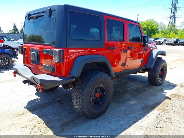 1C4BJWDG5EL115554 Jeep Wrangler Unlimited Sport