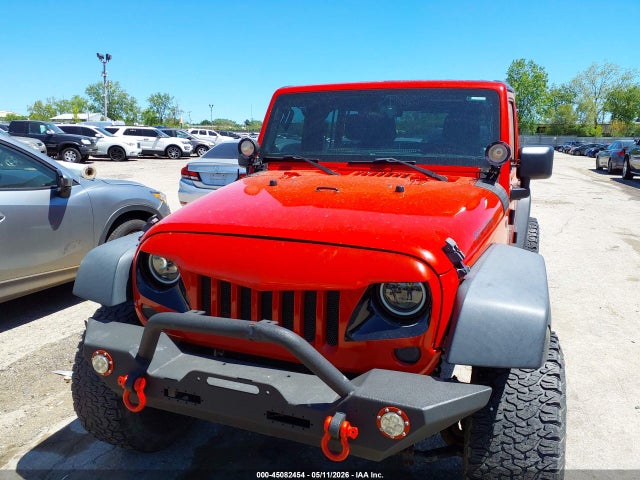 1C4BJWDG5EL115554 Jeep Wrangler Unlimited Sport