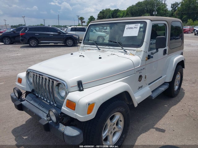 Продажа на аукционе авто 2001 Jeep Wrangler Sahara, vin: 1J4FA59S01P338915, номер лота: 45086391