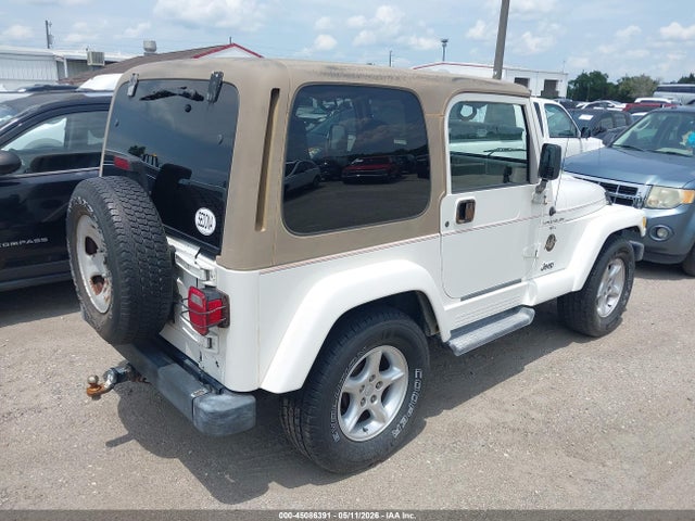 Продажа на аукционе авто 2001 Jeep Wrangler Sahara, vin: 1J4FA59S01P338915, номер лота: 45086391