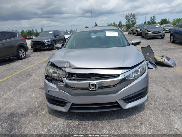 Продажа на аукционе авто 2018 Honda Civic Lx, vin: 2HGFC2F59JH598913, номер лота: 45089137