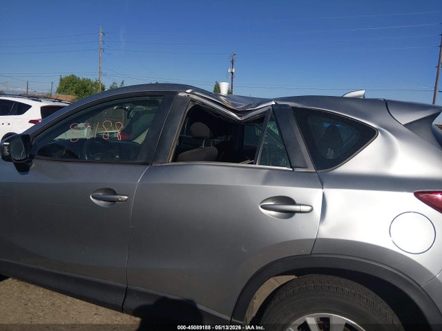 45089188 :رقم المزاد ، JM3KE2BE1E0335071 vin ، 2014 Mazda Cx-5 Sport مزاد بيع