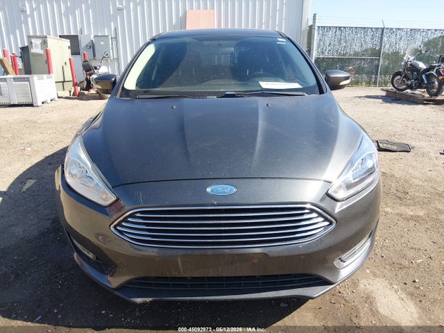Продаж на аукціоні авто 2015 Ford Focus Titanium, vin: 1FADP3N21FL328257, номер лоту: 45092973