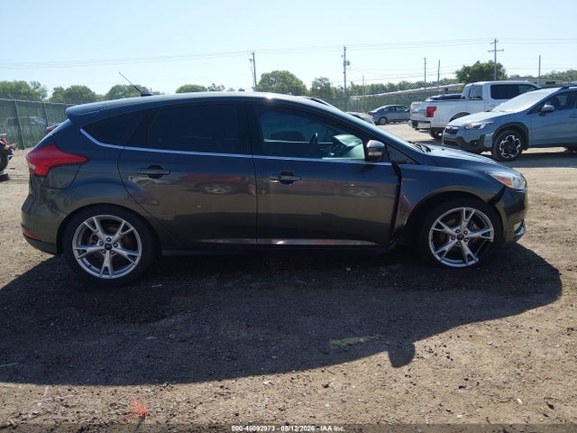 Продаж на аукціоні авто 2015 Ford Focus Titanium, vin: 1FADP3N21FL328257, номер лоту: 45092973