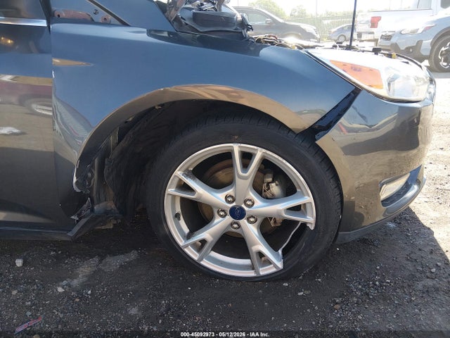 Продаж на аукціоні авто 2015 Ford Focus Titanium, vin: 1FADP3N21FL328257, номер лоту: 45092973