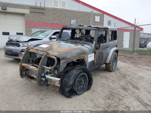 45093437 :رقم المزاد ، 1C4GJWBGXFL528015 vin ، 2015 Jeep Wrangler Sahara مزاد بيع