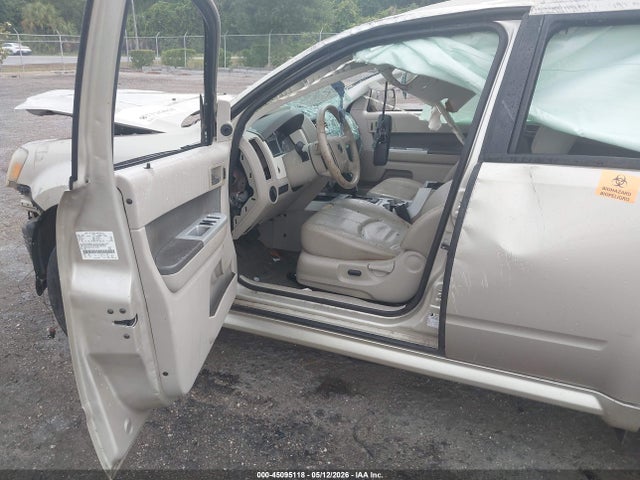 45095118 :رقم المزاد ، 4M2CN8H70AKJ19083 vin ، 2010 Mercury Mariner Premier مزاد بيع