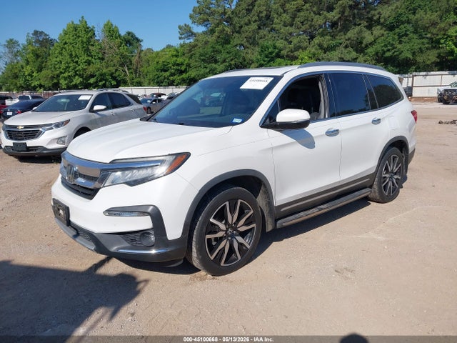 Продажа на аукционе авто 2020 Honda Pilot 2wd Touring 7 Passenger, vin: 5FNYF5H61LB013238, номер лота: 45100668