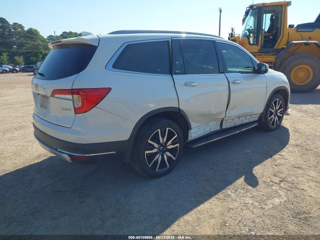 Продажа на аукционе авто 2020 Honda Pilot 2wd Touring 7 Passenger, vin: 5FNYF5H61LB013238, номер лота: 45100668