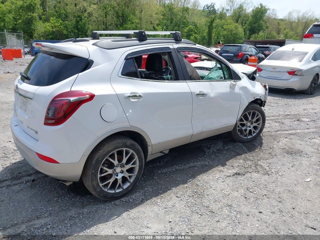 45111605 :رقم المزاد ، KL4CJ2SB3JB653183 vin ، 2018 Buick Encore Sport Touring مزاد بيع
