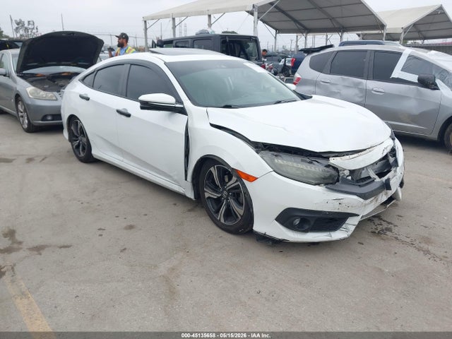 Honda Civic Touring 2016 2HGFC1F95GH645604 main image