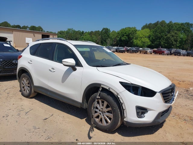 2016 Mazda Cx-5 Touring მანქანა იყიდება აუქციონზე, vin: JM3KE2CYXG0740647, აუქციონის ნომერი: 45138981