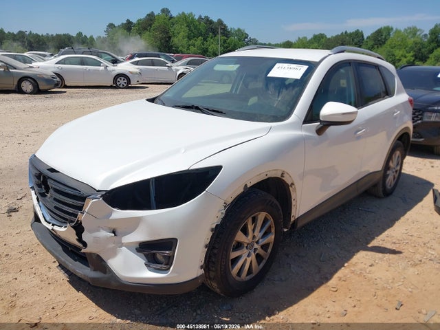 2016 Mazda Cx-5 Touring მანქანა იყიდება აუქციონზე, vin: JM3KE2CYXG0740647, აუქციონის ნომერი: 45138981