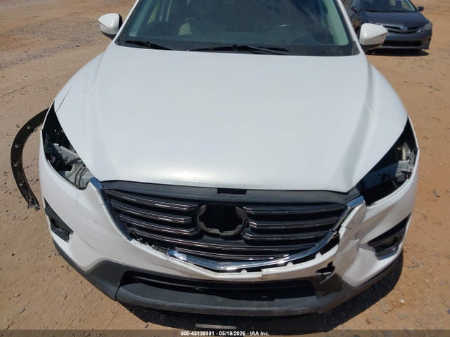 2016 Mazda Cx-5 Touring მანქანა იყიდება აუქციონზე, vin: JM3KE2CYXG0740647, აუქციონის ნომერი: 45138981