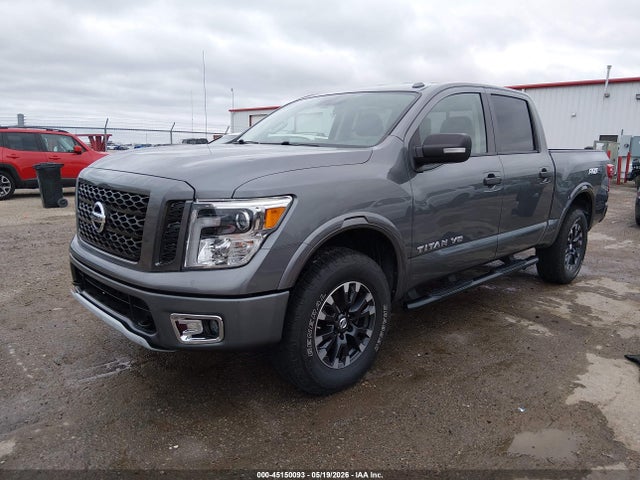45150093 :رقم المزاد ، 1N6AA1E50KN520259 vin ، 2019 Nissan Titan Pro-4x مزاد بيع