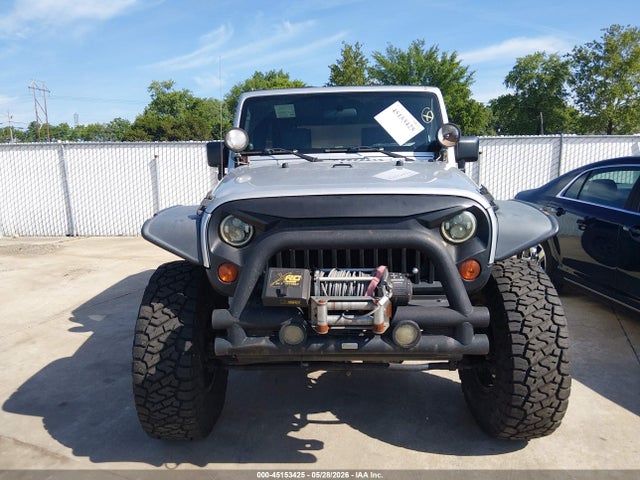 2008 Jeep Wrangler Unlimited Sahara მანქანა იყიდება აუქციონზე, vin: 1J4GA59108L642159, აუქციონის ნომერი: 45153425