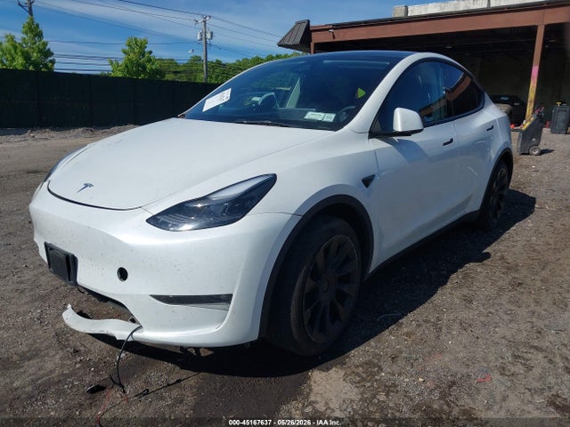 Tesla Model Y Rwd 2023 7SAYGDED1PF915696 Image 2