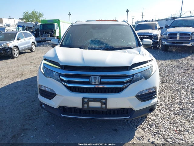 Продажа на аукционе авто 2017 Honda Pilot Touring, vin: 5FNYF6H96HB077086, номер лота: 45169895