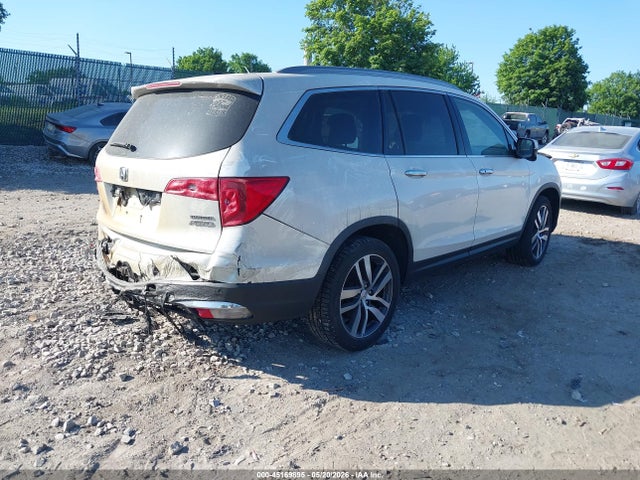 Продажа на аукционе авто 2017 Honda Pilot Touring, vin: 5FNYF6H96HB077086, номер лота: 45169895
