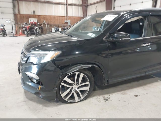 Продажа на аукционе авто 2016 Honda Pilot Touring, vin: 5FNYF6H91GB071002, номер лота: 45170395