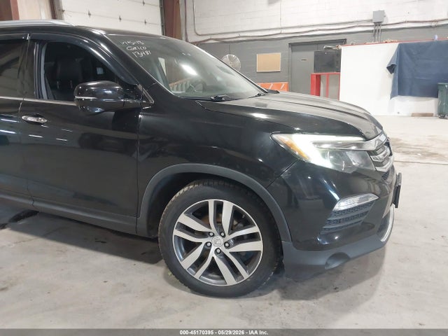 Продажа на аукционе авто 2016 Honda Pilot Touring, vin: 5FNYF6H91GB071002, номер лота: 45170395