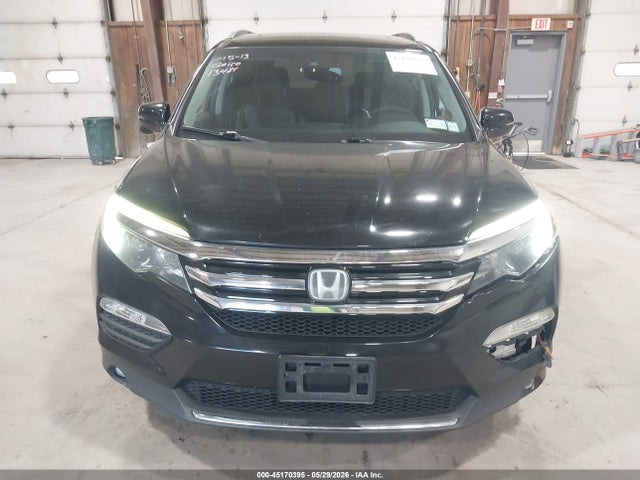 Продажа на аукционе авто 2016 Honda Pilot Touring, vin: 5FNYF6H91GB071002, номер лота: 45170395