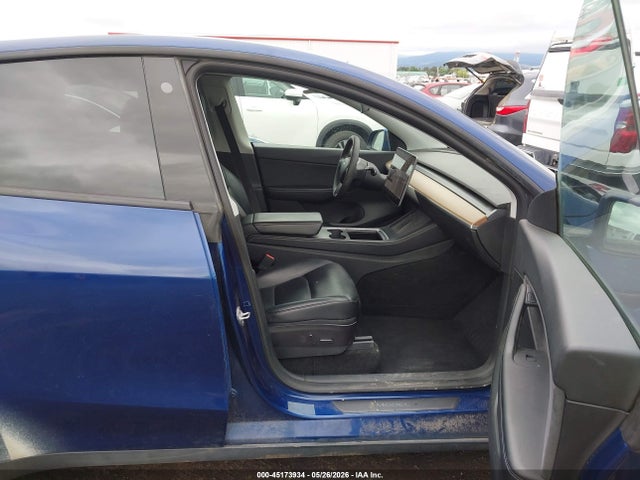 2021 Tesla Model Y Long Range Dual Motor All-wheel Drive მანქანა იყიდება აუქციონზე, vin: 5YJYGDEE3MF231699, აუქციონის ნომერი: 45173934
