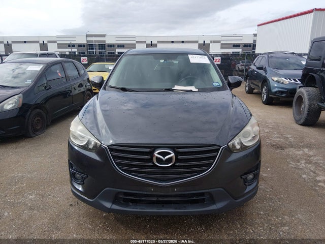 2016 Mazda Cx-5 Touring მანქანა იყიდება აუქციონზე, vin: JM3KE2CYXG0695273, აუქციონის ნომერი: 45177020