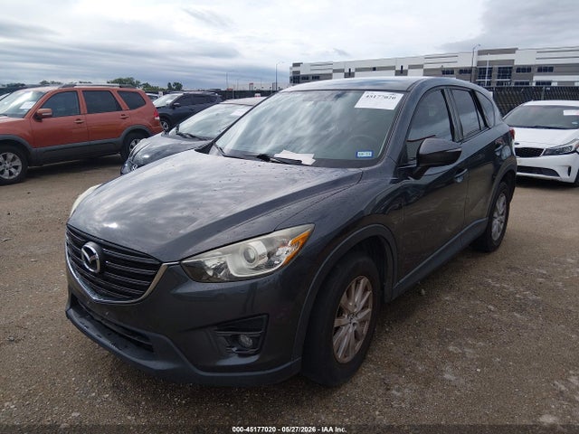 2016 Mazda Cx-5 Touring მანქანა იყიდება აუქციონზე, vin: JM3KE2CYXG0695273, აუქციონის ნომერი: 45177020