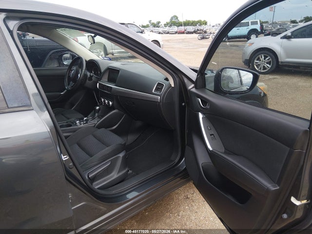 2016 Mazda Cx-5 Touring მანქანა იყიდება აუქციონზე, vin: JM3KE2CYXG0695273, აუქციონის ნომერი: 45177020
