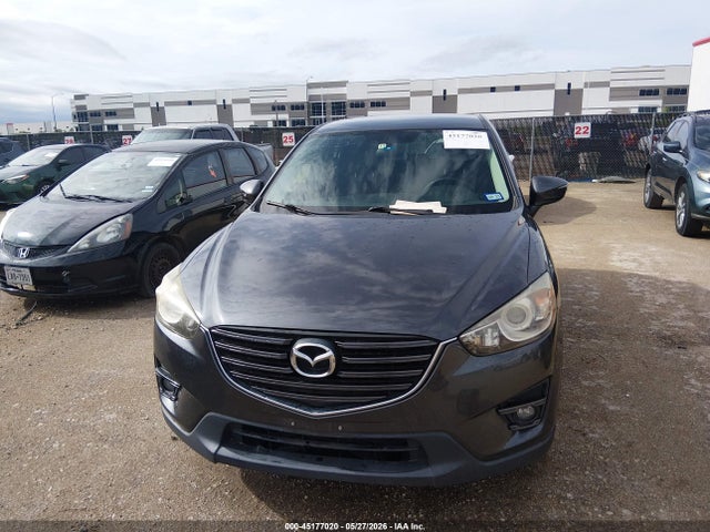 2016 Mazda Cx-5 Touring მანქანა იყიდება აუქციონზე, vin: JM3KE2CYXG0695273, აუქციონის ნომერი: 45177020