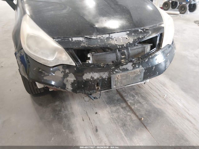 KNADM4A3XE6364532 KIA RIO LX