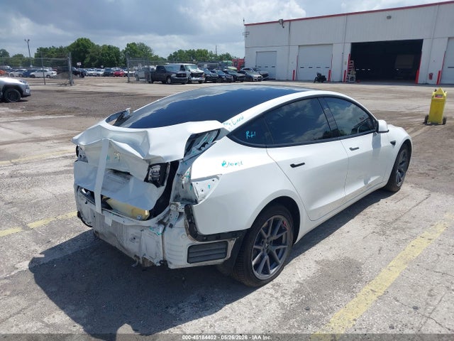 Tesla Model 3 Standard Range Plus Rear-wheel Drive 2021 5YJ3E1EA5MF977440 Image 4