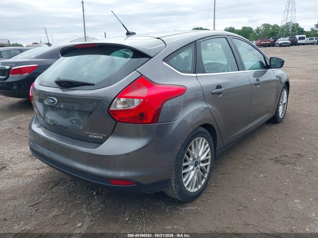Продажа на аукционе авто 2014 Ford Focus Titanium, vin: 1FADP3N26EL380739, номер лота: 45190263
