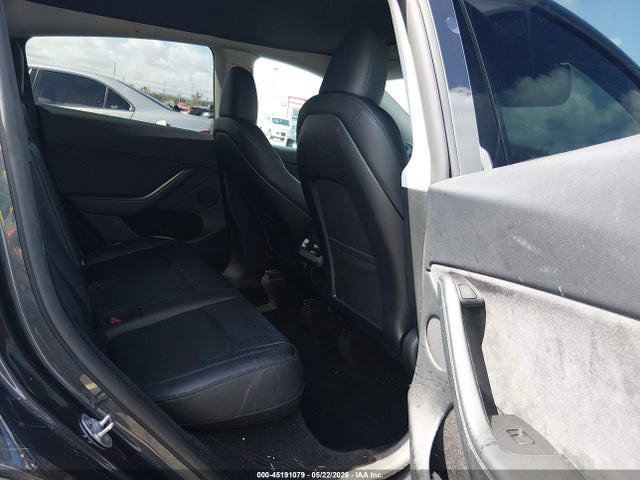2024 Tesla Model Y Long Range Dual Motor All-wheel Drive მანქანა იყიდება აუქციონზე, vin: 7SAYGDEE4RA302562, აუქციონის ნომერი: 45191079