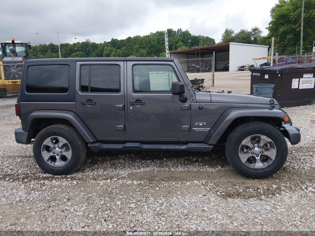 2016 Jeep Wrangler Unlimited Sahara მანქანა იყიდება აუქციონზე, vin: 1C4BJWEG7GL207962, აუქციონის ნომერი: 45191917