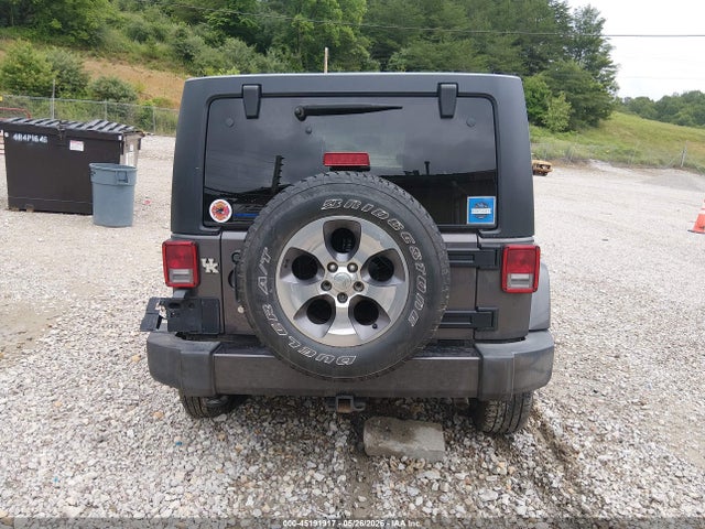 2016 Jeep Wrangler Unlimited Sahara მანქანა იყიდება აუქციონზე, vin: 1C4BJWEG7GL207962, აუქციონის ნომერი: 45191917