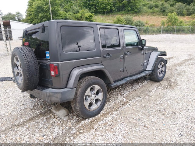 2016 Jeep Wrangler Unlimited Sahara მანქანა იყიდება აუქციონზე, vin: 1C4BJWEG7GL207962, აუქციონის ნომერი: 45191917