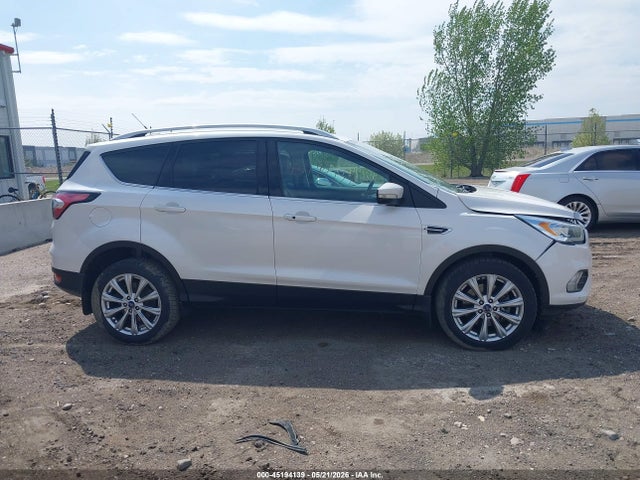 Продажа на аукционе авто 2017 Ford Escape Titanium, vin: 1FMCU9J97HUE16260, номер лота: 45194139