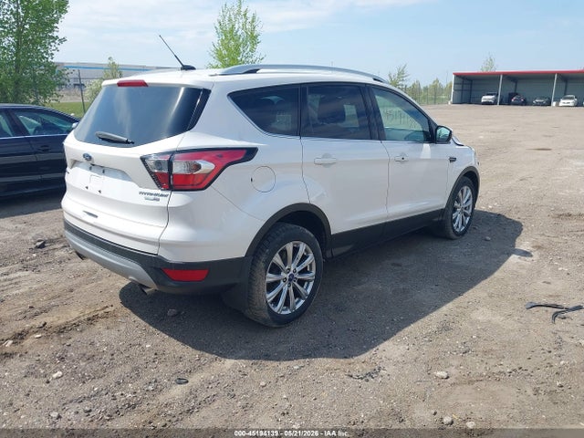 Продажа на аукционе авто 2017 Ford Escape Titanium, vin: 1FMCU9J97HUE16260, номер лота: 45194139