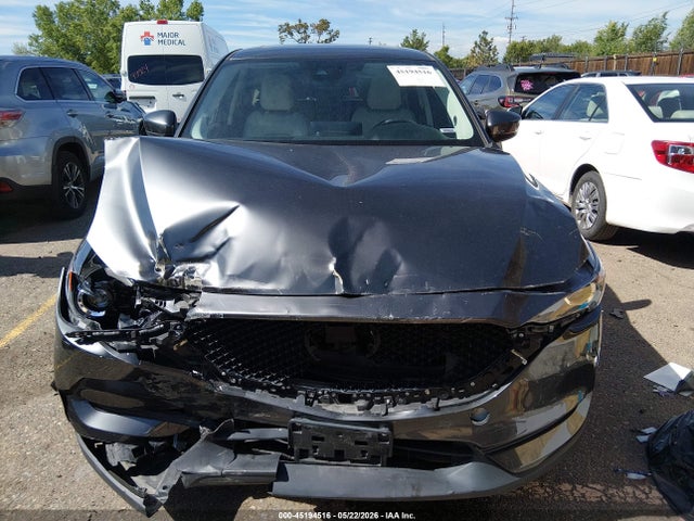 2021 Mazda Cx-5 Touring მანქანა იყიდება აუქციონზე, vin: JM3KFBCM1M1370107, აუქციონის ნომერი: 45194516