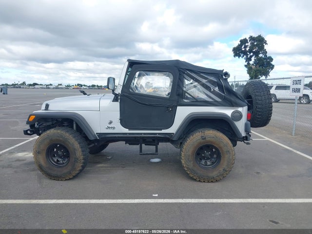 2002 Jeep Wrangler X მანქანა იყიდება აუქციონზე, vin: 1J4FA39S52P770499, აუქციონის ნომერი: 45197622