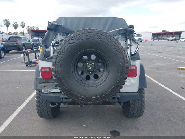 2002 Jeep Wrangler X მანქანა იყიდება აუქციონზე, vin: 1J4FA39S52P770499, აუქციონის ნომერი: 45197622