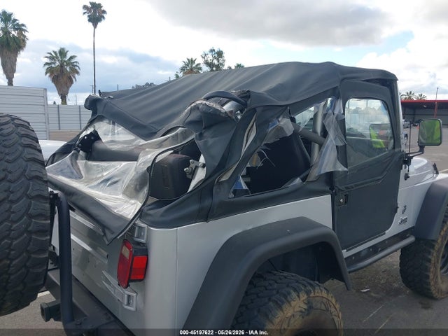 2002 Jeep Wrangler X მანქანა იყიდება აუქციონზე, vin: 1J4FA39S52P770499, აუქციონის ნომერი: 45197622
