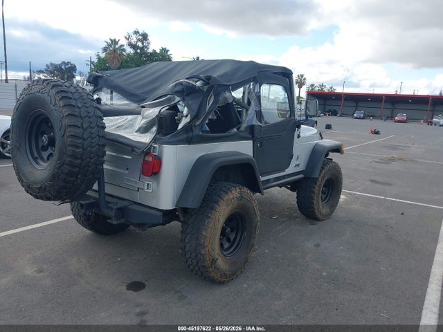 2002 Jeep Wrangler X მანქანა იყიდება აუქციონზე, vin: 1J4FA39S52P770499, აუქციონის ნომერი: 45197622