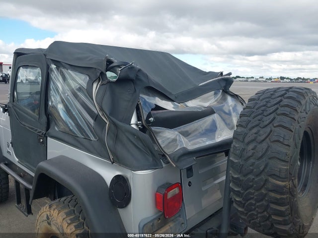 2002 Jeep Wrangler X მანქანა იყიდება აუქციონზე, vin: 1J4FA39S52P770499, აუქციონის ნომერი: 45197622