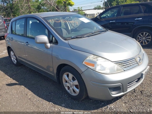 2009 Nissan Versa 1.8sl მანქანა იყიდება აუქციონზე, vin: 3N1BC13E59L405058, აუქციონის ნომერი: 45202604