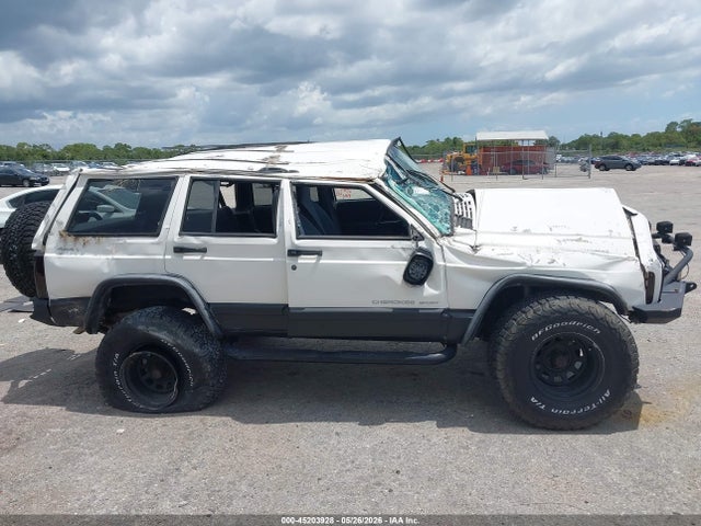 Auction sale of the 2000 Jeep Cherokee Sport, vin: 1J4FF48S0YL142584, lot number: 45203928