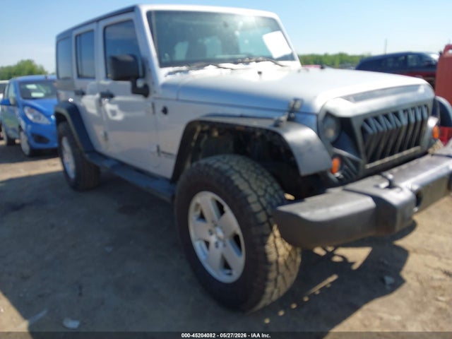 45204082 :رقم المزاد ، 1J4BA5H18BL635804 vin ، 2011 Jeep Wrangler Unlimited Sahara مزاد بيع